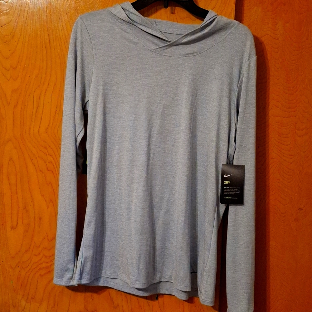 Ladies top Nike size medium, color Grey new with tag